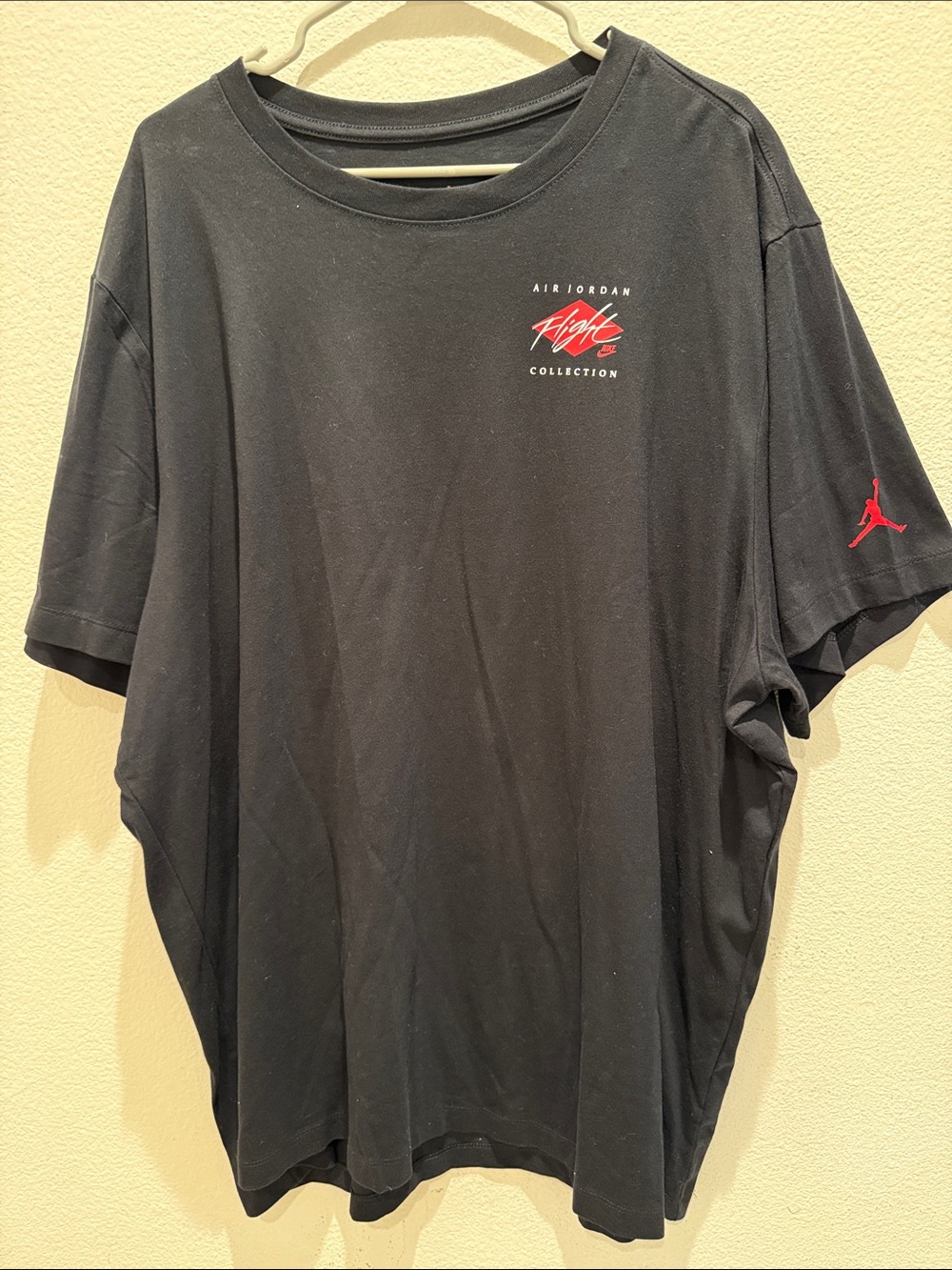 Jordan Black Tee with Red Flight Collection Logo